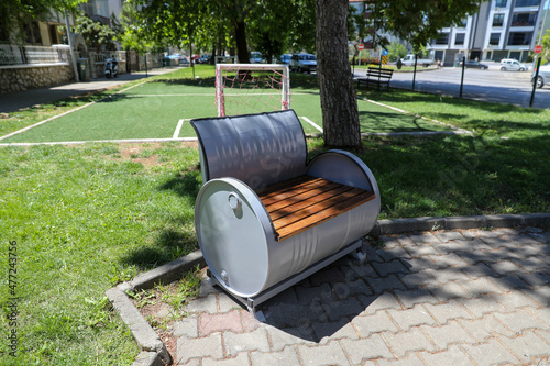 oil drums are recycled into garden chairs