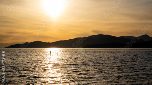 Gold reflection of sunset in ocean