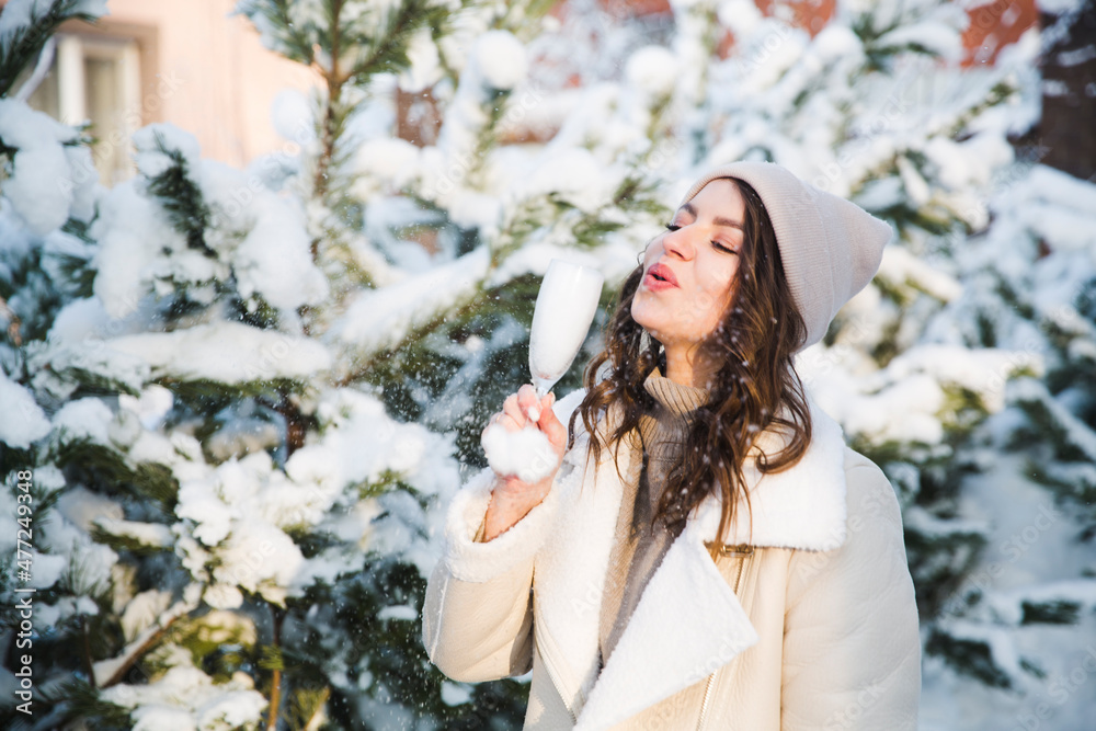 Happy New Year concept. Christmas holiday. girl with glass with snow in winter outdoor Happy New Year concept. Christmas holiday. girl with glass with snow in winter outdoor