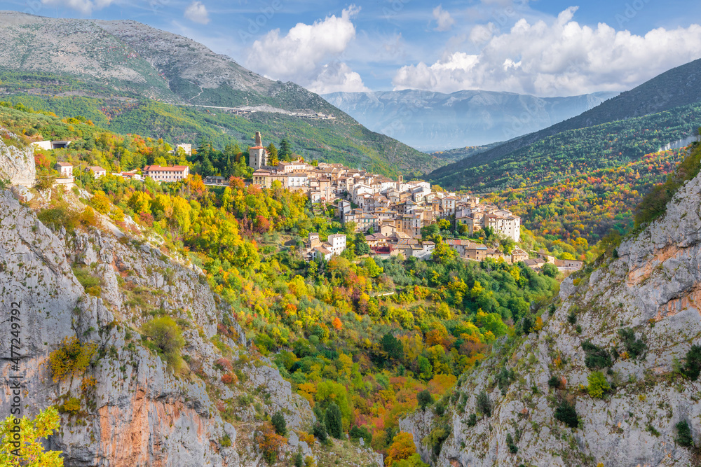 Villalago (Abruzzo, Italy) - A view of medieval village in province of L'Aquila, situated in the gorges of Sagittarius, with Lago San Domenico lake, bridge and sanctuary. Here during autumn foliage