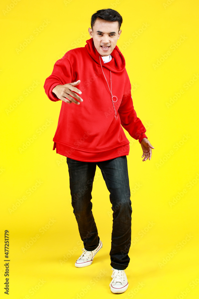 Handsome young Asian boy confidently walking forward to invite smart man to persuade happy casual fashion of vogue Handsome young Asian boy confidently walking forward to invite smart man to persuade happy casual fashion of vogue