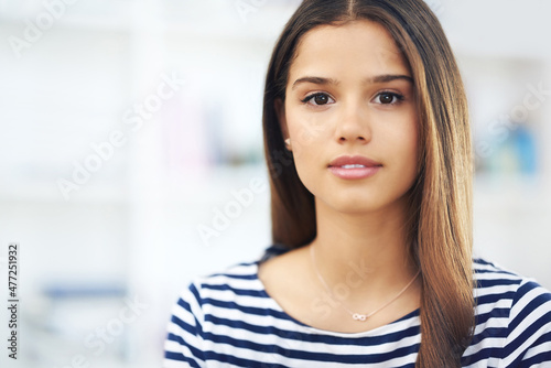 Portrait of an attractive young woman relaxing at home