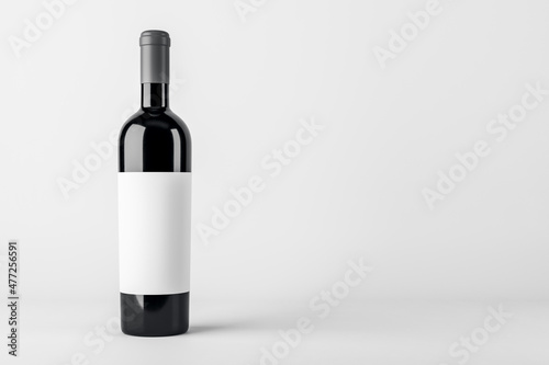 Fototapeta Empty wine botte with mock up place on white backdrop