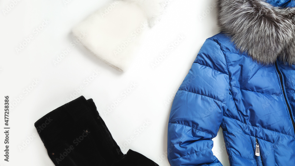 women winter concept. autumn and winter fashion woman's outfit. Jacket, hat, trousers, jumper