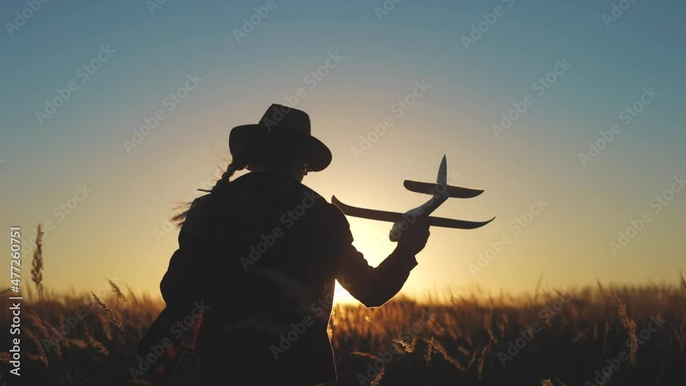 child run in the park with the plane. happy family kid airplane dream concept. little girl silhouette running at in the park. little girl playing toy plane. kid play dream sunset an astronaut pilot child run in the park with the plane. happy family kid airplane dream concept. little girl silhouette running at in the park. little girl playing toy plane. kid play dream sunset an astronaut pilot