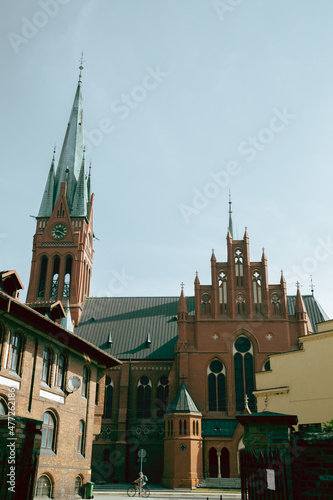 Torun old town street, Kosciol Rzymskokatolicki pw. sw. Katarzyny church in Poland photo