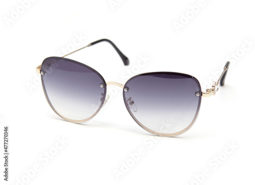 Fashionable sunglasses for women. blue glass. beautiful shape. on white isolated background.
