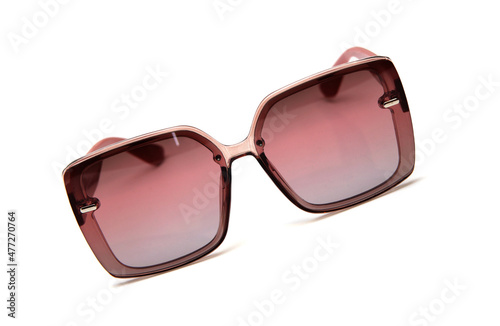 Fashionable sunglasses for women. burgundy glass. beautiful form. on white isolated background. © ELENA