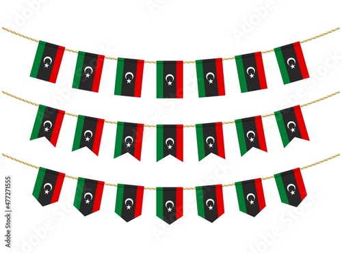 Libya flag on the ropes on white background. Set of Patriotic bunting flags. Bunting decoration of libya flag photo