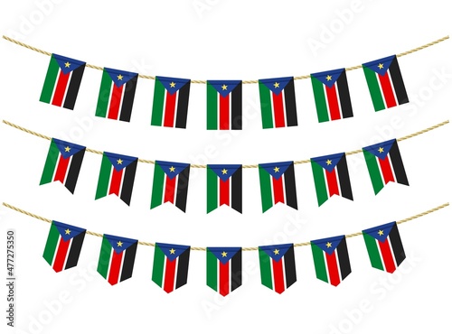 South Sudan flag on the ropes on white background. Set of Patriotic bunting flags. Bunting decoration of South Sudan flag