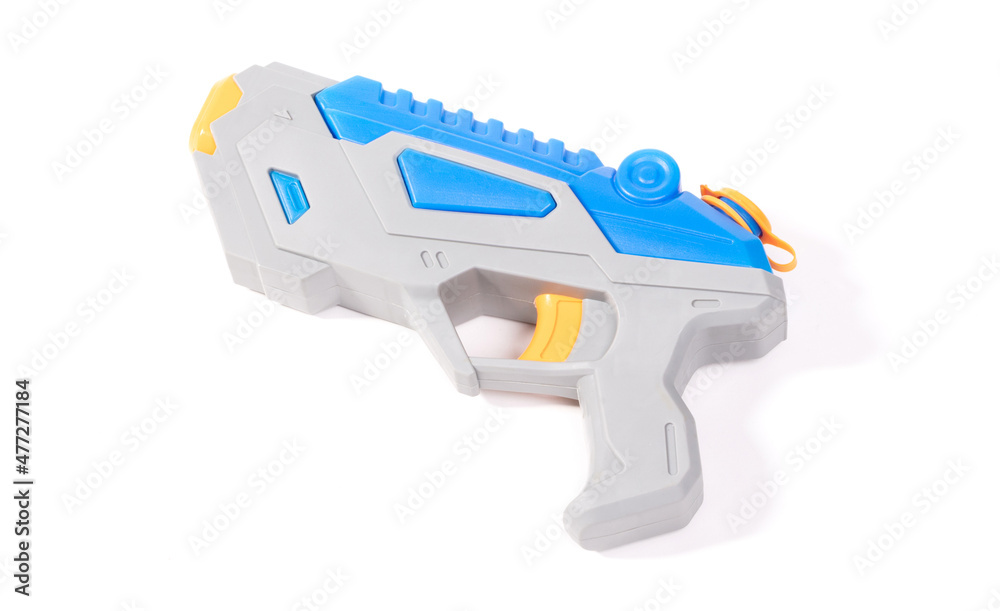 Modern small water pistol isolated on white Modern small water pistol isolated on white