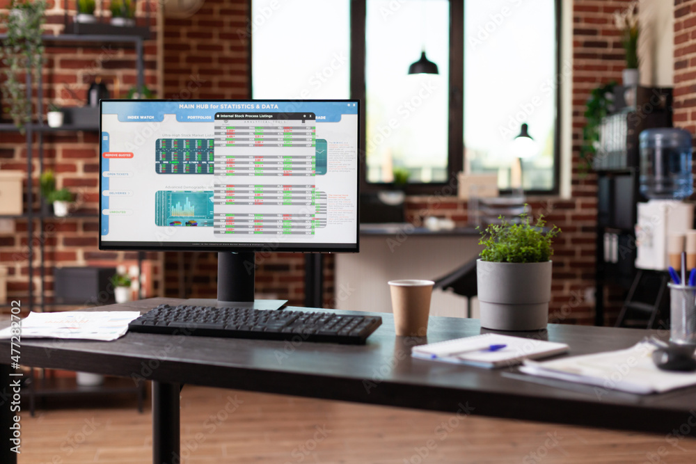 Stock market trade exchange on monitor in business office. Nobody in startup space with computer showing global statistics and analysis to invest in crypto currency. Online banking Stock market trade exchange on monitor in business office. Nobody in startup space with computer showing global statistics and analysis to invest in crypto currency. Online banking