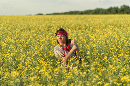 girl in spring blossoming field