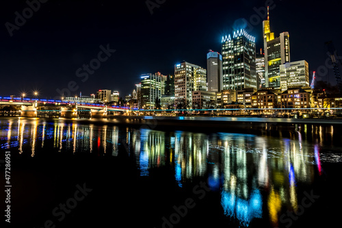 The skyline of Frankfurt - Main at night at a cold day in winter.