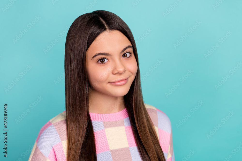 Fototapeta premium Photo of sweet adorable school girl dressed prink pullover empty space isolated teal color background
