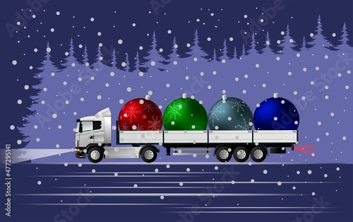 Very peri. Color of the year. A modern European truck with a semi-trailer carries Christmas tree decorations for the New Year and Christmas at night from the forest to a blizzard.