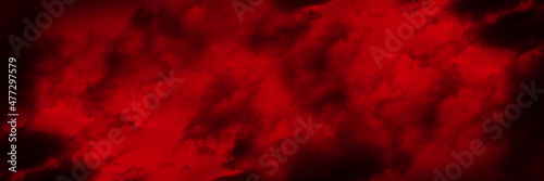 Black red abstract background. Toned fiery red sky. Flame and smoke effect. Fire background with space for design. Armageddon, apocalypse, spooky, halloween, inferno, hell, evil concept. Wide banner. 