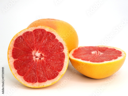 Red grapefruit whole and halved