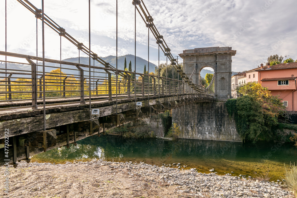 Fototapeta premium The ancient Ponte delle Catene bridge, that connects Chifenti with Fornoli, Lucca, Italy