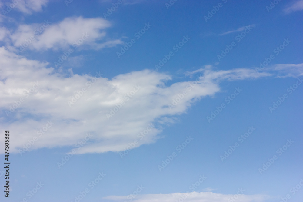 Blue sky with white cloud. Soft cloud. Daylight.