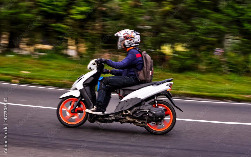 Random Motorbiker at the street Random Motorbiker at the street