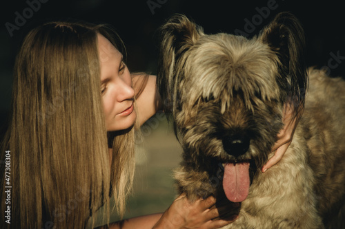 girl with a big dog portrait close-up