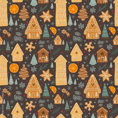 Vector seamless pattern, isolated elements on a gray background: gingerbread, Christmas trees, snowflakes, branches, orange slices, New Year mood, gingerbread houses and figurines