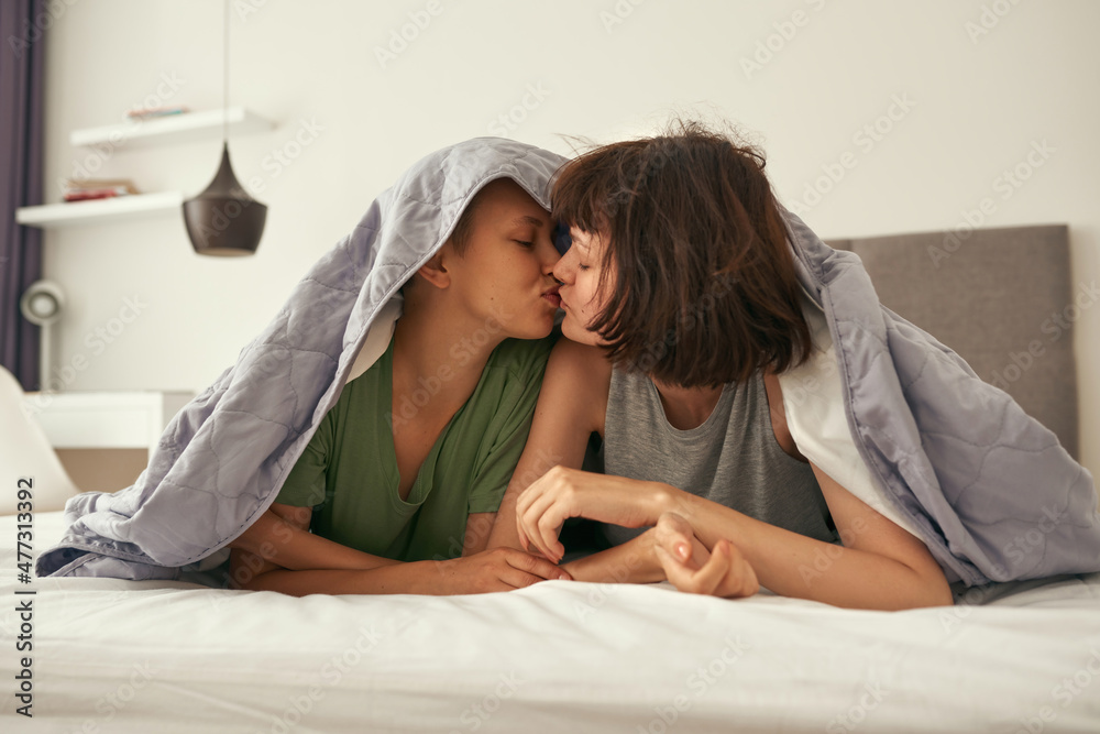 Girls Kissing On Beds