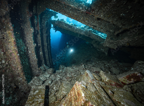A diver inside the Chrisoula K. shipwreck, Egypt