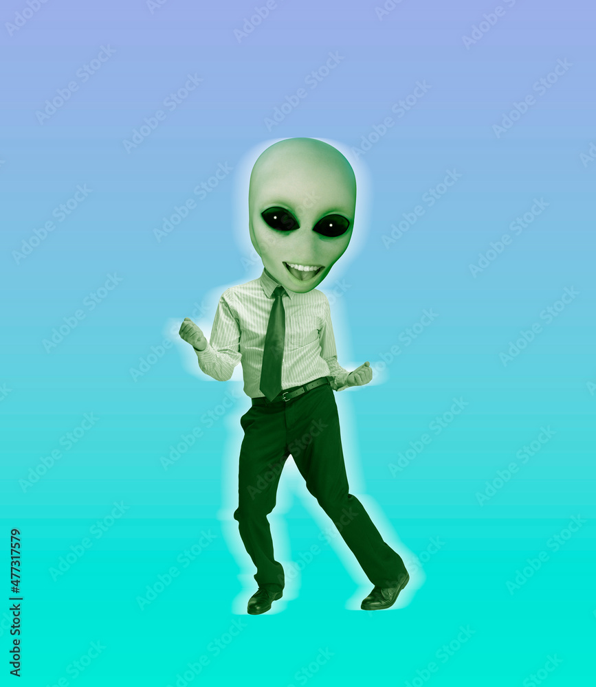 Happy green alien with human body dancing retro style dance isolated on blue background. Contemporary art collage. Happy green alien with human body dancing retro style dance isolated on blue background. Contemporary art collage.