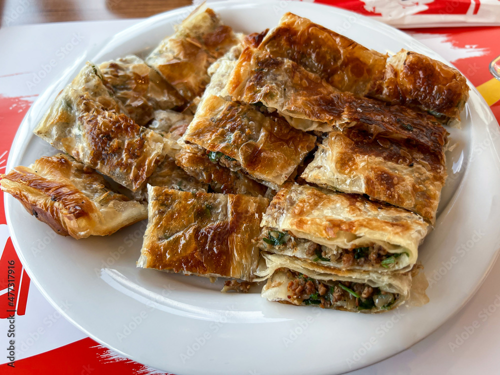 Fototapeta premium Antalya Turkey traditional handmade spread pastry. Turkish name Serpme Borek