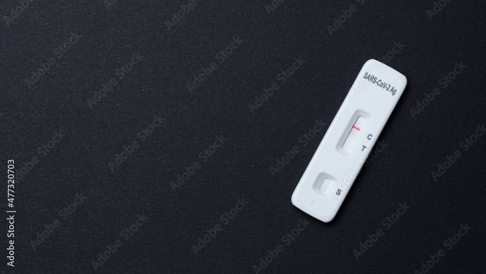 Negative Sars-Cov-2 antigen rapid test on black background Negative Sars-Cov-2 antigen rapid test on black background