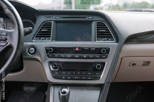 Gray Interior Details. Media system in the car © Hanna Chayka