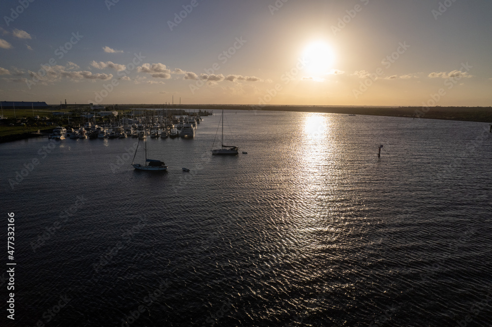 Naklejka premium sunset over the river