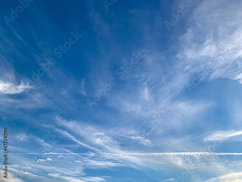Summertime. Beautiful blue sky with fluffy clouds. Altocumulus, cirrocumulus clouds