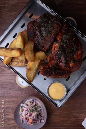 Chickern Grilled with pataos and Coleslaw Salad photo