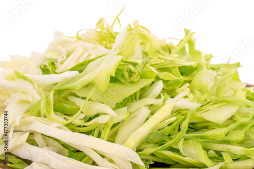 Fresh shredded white cabbage, close-up, isolated on white.