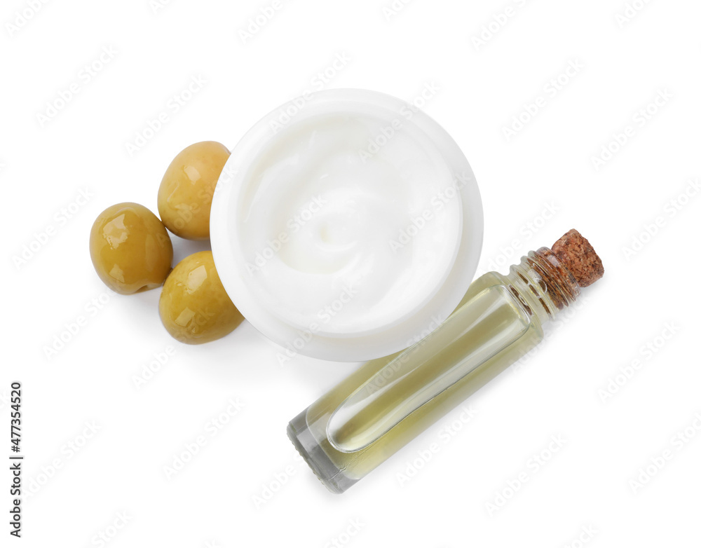 Body cream and cosmetic product with olives on white background, top view Body cream and cosmetic product with olives on white background, top view