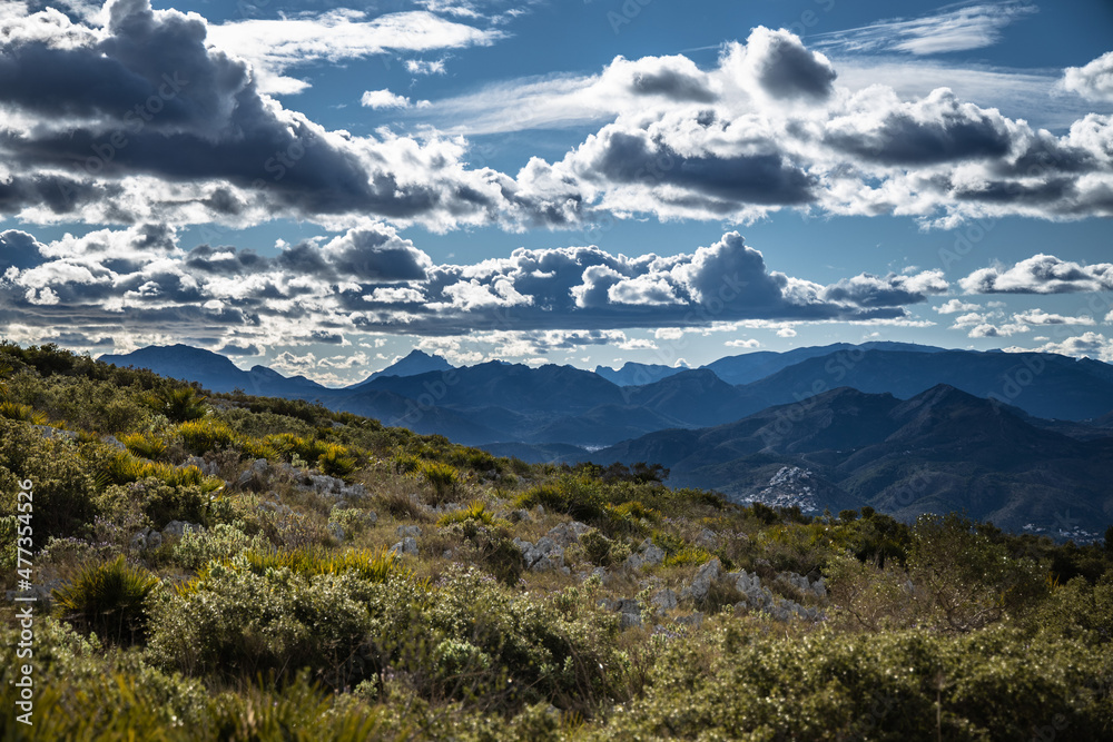 Landscape view of the mountains and clouds, beautiful nature of Montgo mountain, Spain