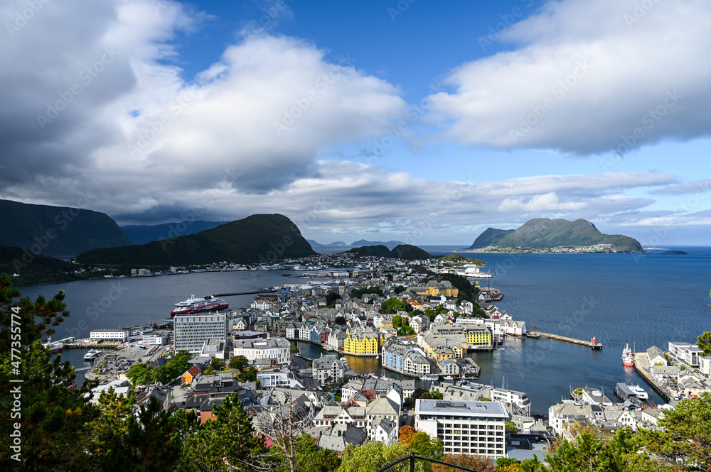 Cityscape of Alesund, Norway on a cloudy day.