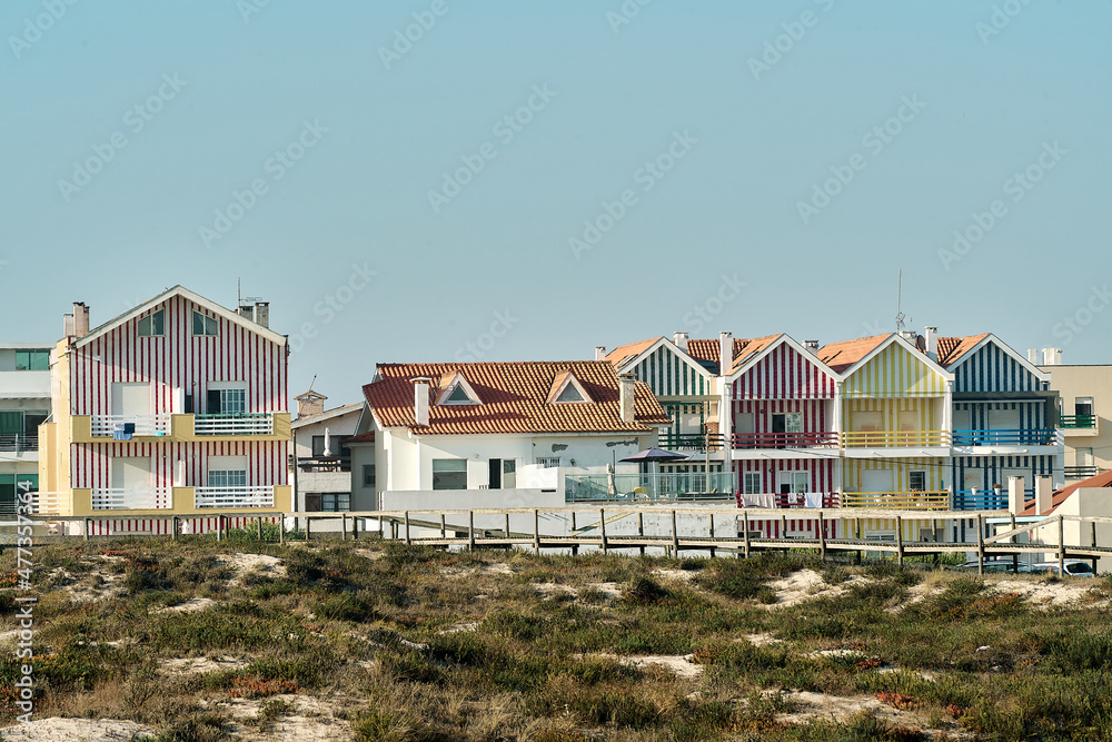 Colorful houses called palheiros in the fisherman village of Costa Nova Colorful houses called palheiros in the fisherman village of Costa Nova