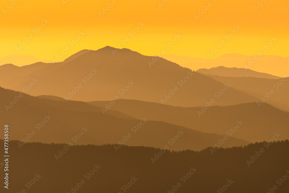 Sunset mountain silhouettes, colorful and vibrant
