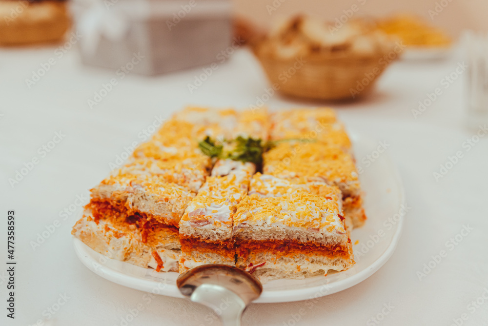 Various delicious canapes and savory cakes served on a plate Various delicious canapes and savory cakes served on a plate