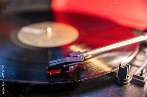 Canvas Print Turntable vinyl record player, disco neon light background