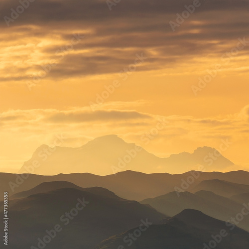 Antisana volcano silhouette at sunrise, Antisana Ecological Reserve, Quito, Ecuador.