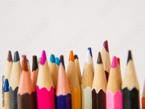 pile of colored pencils close up in creativity concept
