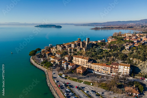 Aerial view of Passignano sul Trasimeno, a small town along the lake near Perugia, Umbria, Italy. photo