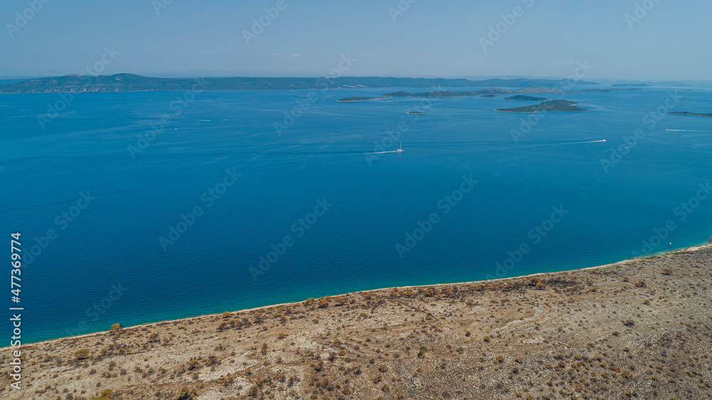 Aerial view of Otocic Lavdara, a beautiful island along the Croatian coastline, Croatia. Aerial view of Otocic Lavdara, a beautiful island along the Croatian coastline, Croatia.