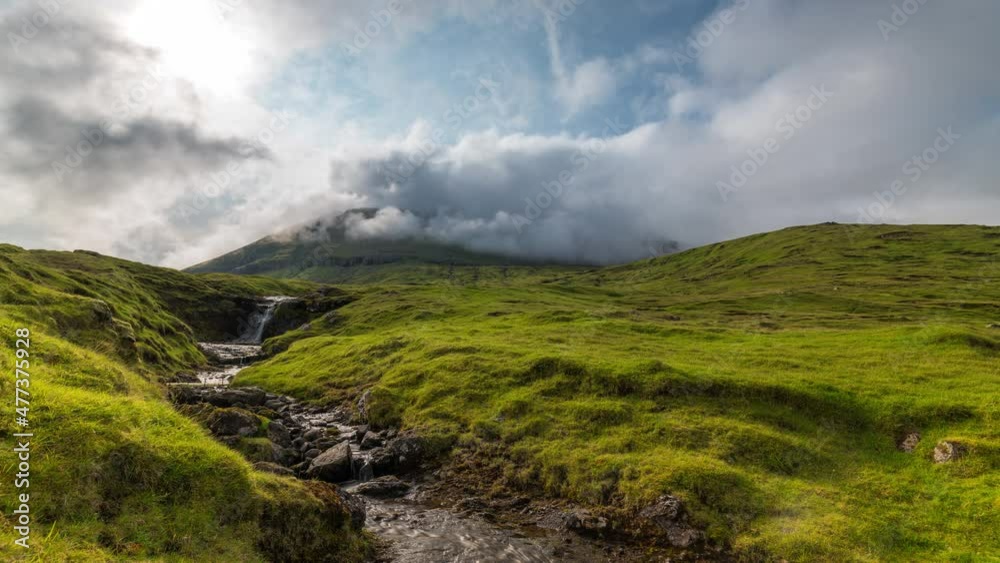 Faroe Islands Timelapse of a waterfall in clouds Faroe Islands Timelapse of a waterfall in clouds