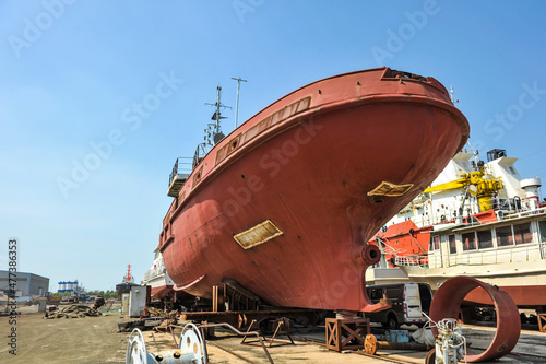 Ships and tugboat equipment for maintenance at shipyards